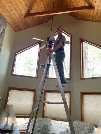 An image of a handyman doing some light repairs