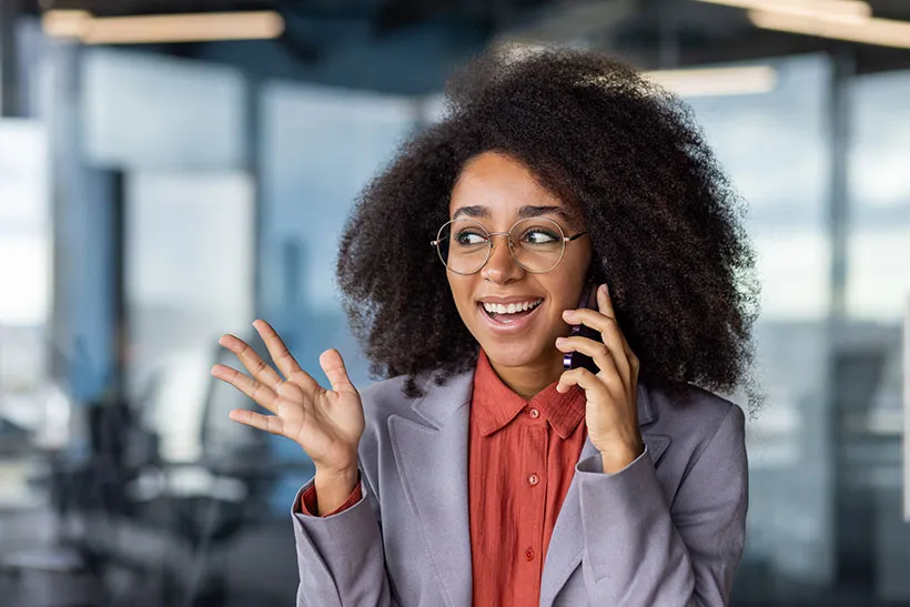 Confident business woman talking on the phone